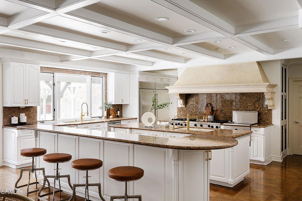 Executive library with walnut bookcases.